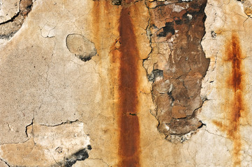 Old cracked and weathered concrete wall, background texture.