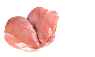 raw chicken fillets close up on white
