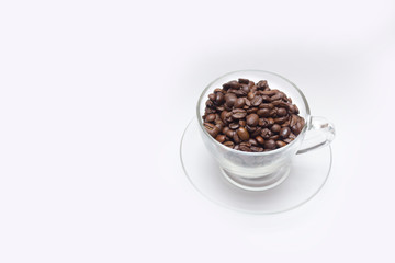 Coffee concept, coffee beans in a glass cup
