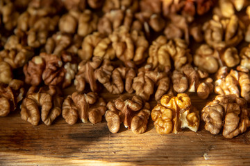 tasty healthy peeled walnuts on a wooden board