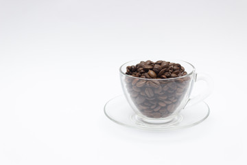 Coffee concept, coffee beans in a glass cup
