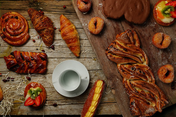 Bread on a wooden background in the rustic style
