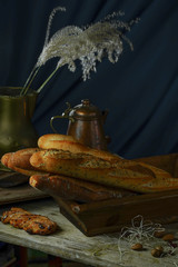 Bread on a wooden background in the rustic style