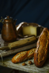 Bread on a wooden background in the rustic style