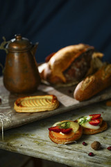 Bread on a wooden background in the rustic style