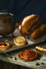 Bread on a wooden background in the rustic style