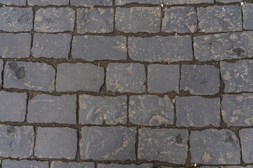 paving stones close up. graphic gray background.