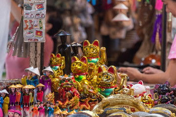 Waving cats