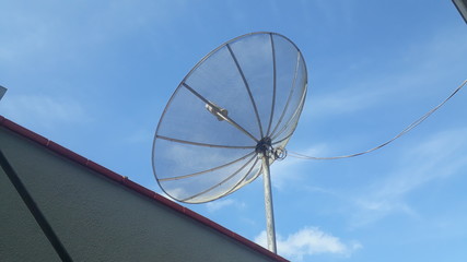 satelite dish on top building