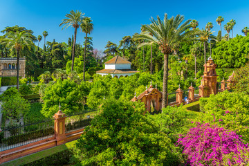 Fototapeta na wymiar The idyllic garden in the Royal Alcazars of Seville, Andalusia, Spain. 