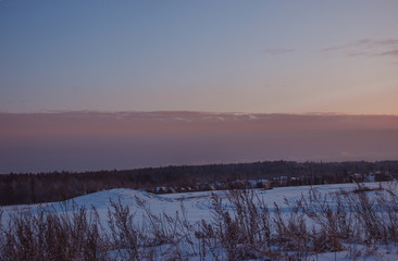 nature winter background . Winter  village landscape at sunset.