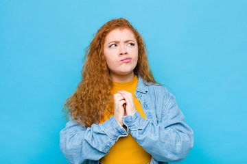 young red head woman scheming and conspiring, thinking devious tricks and cheats, cunning and...