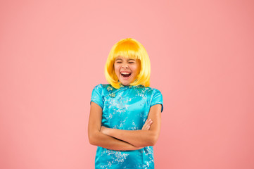 Pop culture. Anime fan. Cosplay kids party. Child cute cosplayer. Cosplay outfit. Otaku girl wig smiling pink background. Cosplay character concept. Hobby and entertainment. Eastern trends for teens