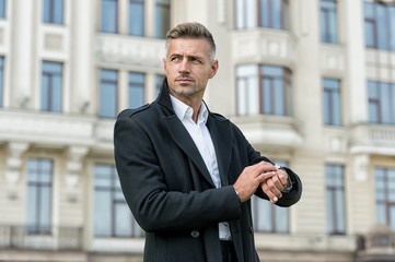 Whats the time. Businessman check watch outdoors. Handsome businessman hurry to business meeting....