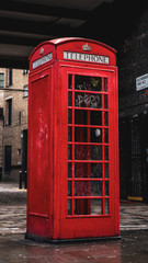 red dirty telephone box