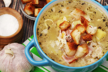 A bowl with traditional Czech garlic soup cesnecka	