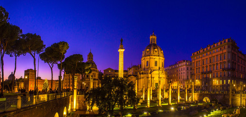 Fototapeta na wymiar Roman Forum Ruins at Night. Ancient Government Buildings in the Center of Rome, Italy.
