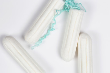 clean cotton tampons isolated on white white background, menstrual concept