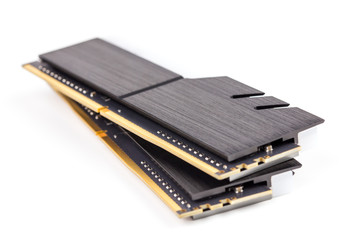 a pair of ddr4 dimm pc ram memoty modules with stylish black heatsinks - isolated on white with...