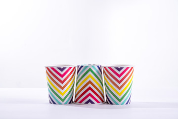 Three paper striped party glass on a white background
