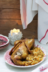 Baked duck with cabbage in a festive decoration. Rustic style.