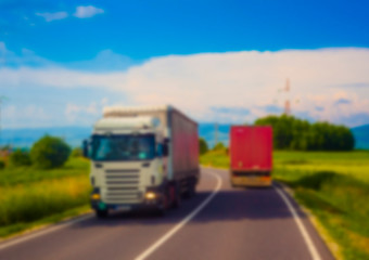 abstract blur of truck driving on road. transportation concept