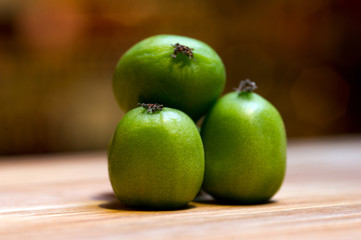 sale of exotic peelless kiwi fruits, still life on the market