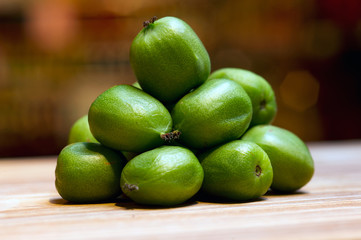 sale of exotic peelless kiwi fruits, still life on the market