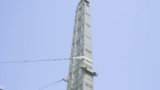 Top to Base slow tilt down reveal of Stele Number 3 in the Northern Stelae Field of ancient Aksum, Ethiopia