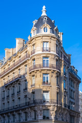 Fototapeta na wymiar Paris, typical facade and windows, beautiful building rue Reaumur