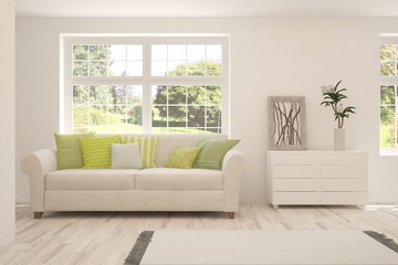 Stylish room in white color with sofa and summer landscape in window. Scandinavian interior design. 3D illustration