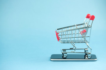 shopping cart on a smartphone, an online shopping concept