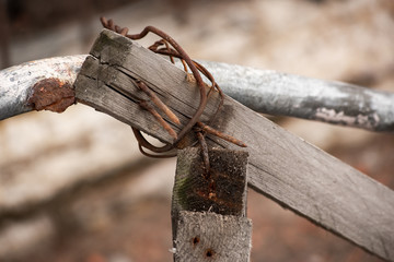 A piece of wood with rusty nails