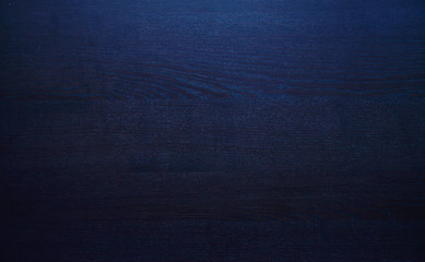 wood brown grain texture pattern. top view of wooden table surface, dark background. Wood wall...
