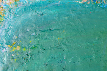 Background image of bright oil-paint palette closeup.