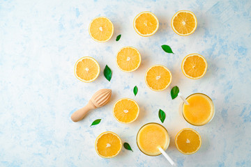oranges for making juice, pattern, on a blue background