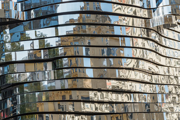 Chromed Metal background. Reflections over slices of shiny metal