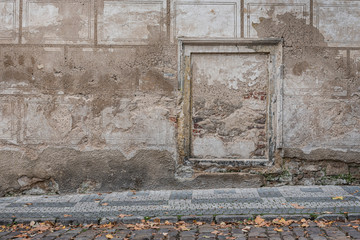 Old wall with a stone frame. Great background to put an image