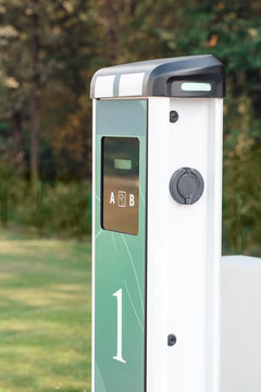 Tramsportation. Elcetric Car Charging Station No People Side View Close-up