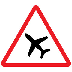 Airport warning sign or low flying airplane, red triangle background. Caution symbol.