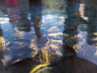Water reflection under a glass table
