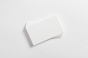 Top view of blank business cards isolated on white background