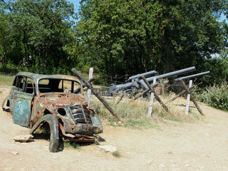 German battery of heavy howitzers in the firing position. Weapons of the second world war, historical reconstruction.
