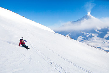 Fototapeta na wymiar snowboarder on mountain slope