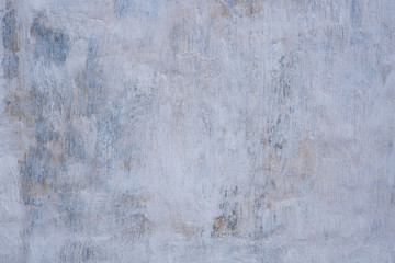 Wall with a layer of whitewash, background, texture.
