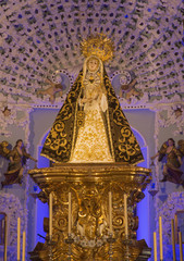 The traditional vested Virgin Mary statue on the main altar of church Iglesia de Nuestra Senora de los Dolores (Our Lady of Sorrows)