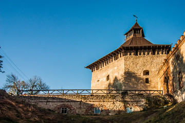 Medzhybizh castle with sunset rays  in Khmelnytskyi Oblast, Ukraine