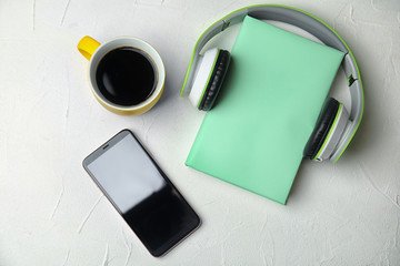 Flat lay composition with book on white table