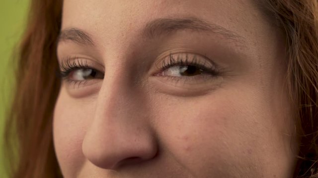 Closeup portrait of woman eyes looking to camera