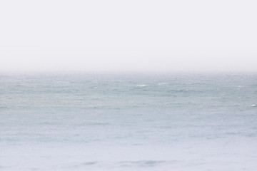 Fototapeta na wymiar horizon above atlantic ocean with fog